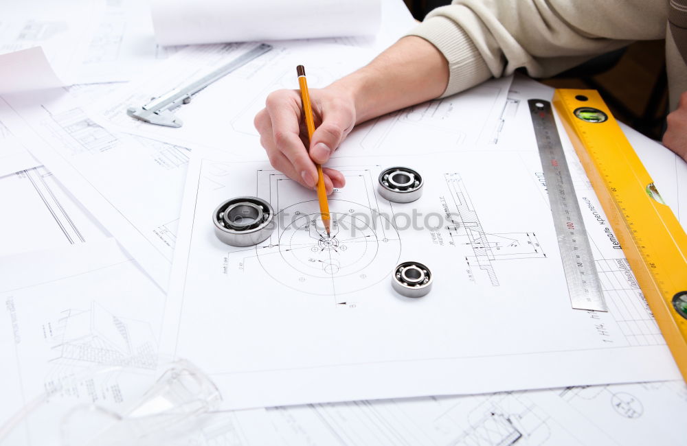 Similar – Architekt oder Planer, der an Zeichnungen für Baupläne arbeitet