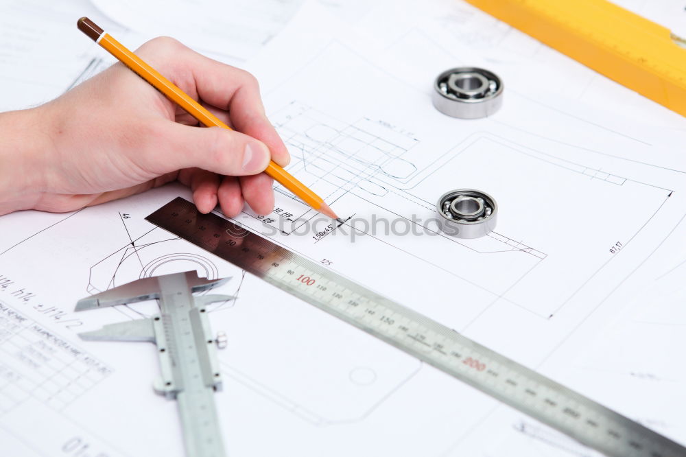 Similar – Image, Stock Photo Architect or planner working on drawings for construction