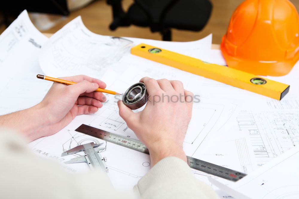 Similar – Image, Stock Photo Architect or planner working on drawings for construction