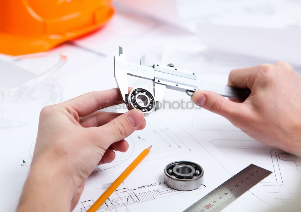 Similar – Image, Stock Photo Architect or planner working on drawings for construction