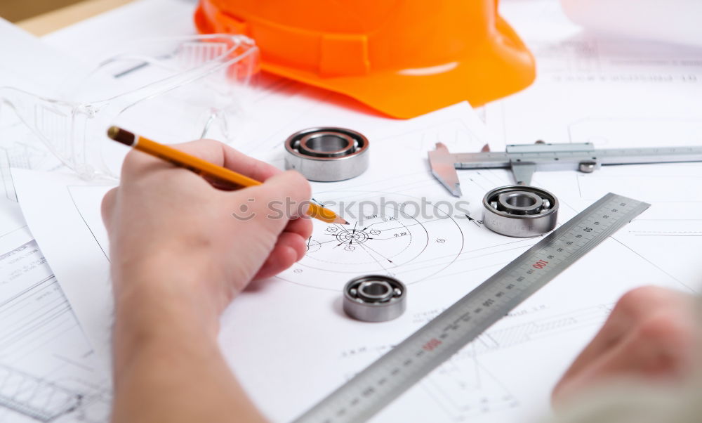 Similar – Image, Stock Photo Architect or planner working on drawings for construction