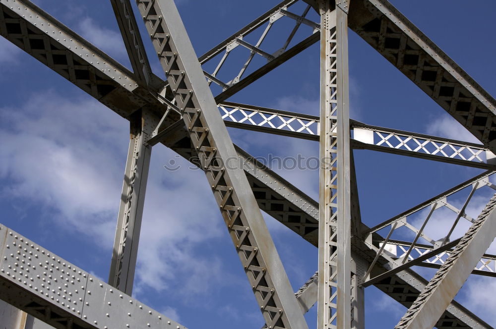 Similar – Power pole from the inside from the frog’s perspective in front of a blue sky