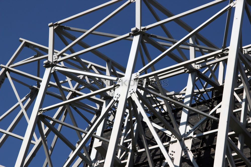 Similar – Power pole from the inside from the frog’s perspective in front of a blue sky