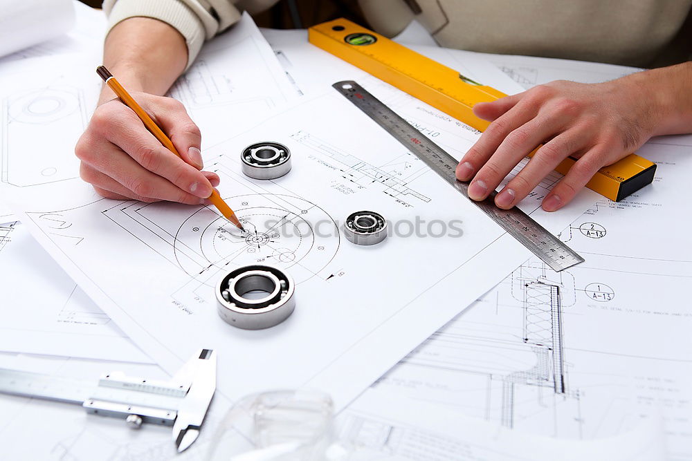 Similar – Architekt oder Planer, der an Zeichnungen für Baupläne arbeitet