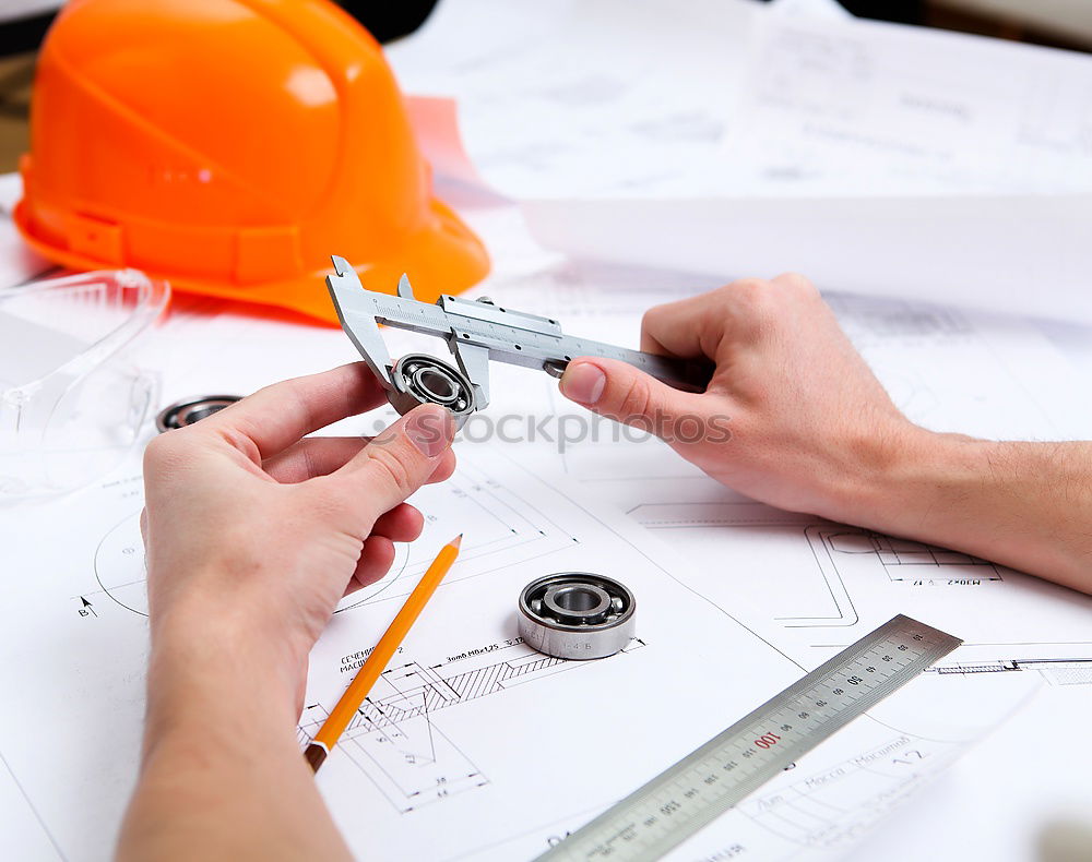 Similar – Image, Stock Photo Architect or planner working on drawings for construction