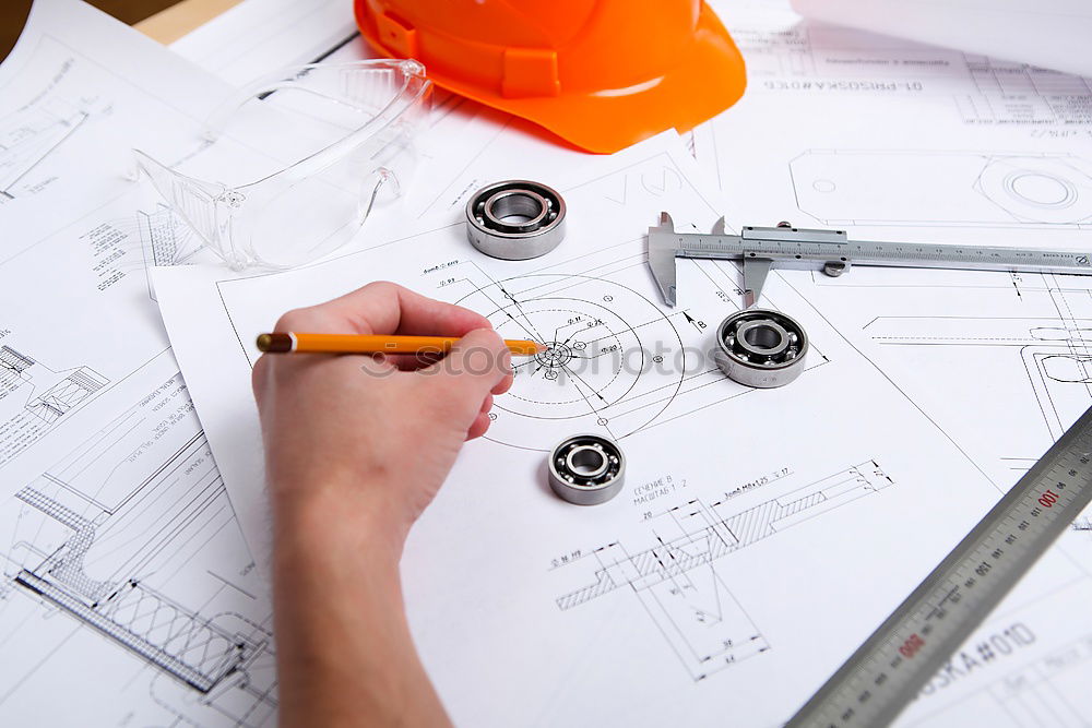 Similar – Image, Stock Photo Architect or planner working on drawings for construction