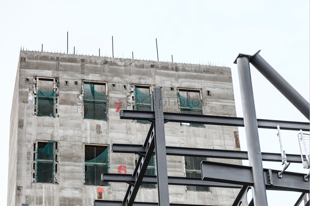 Similar – Foto Bild Bauzaun aus Holz vor dem Neubau eines Wohnhaus mit Baugerüst am ehemaligen Hafen in Offenbach am Main in Hessen