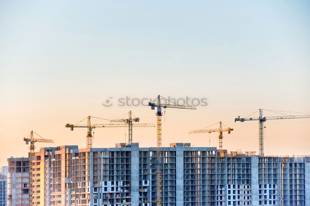 Construction site with building cranes