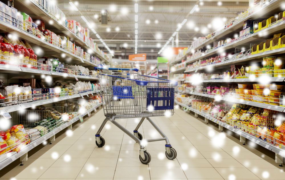 Similar – Image, Stock Photo Empty shopping cart in the supermarket corridor