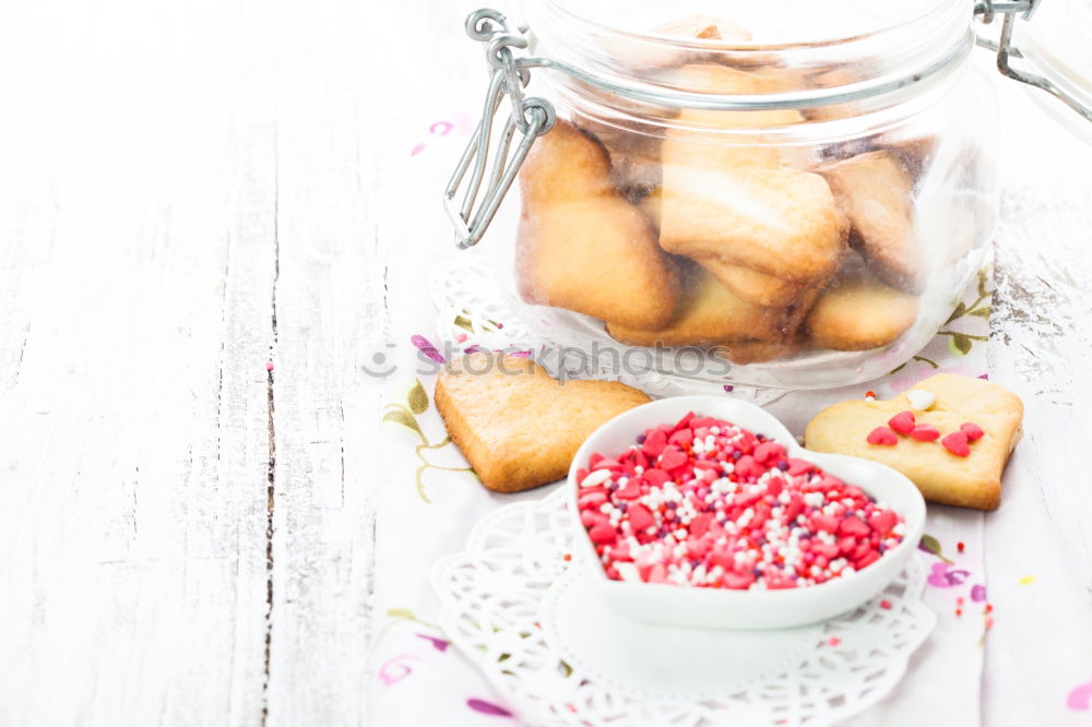 Similar – Image, Stock Photo Gingerbread cookies, candies, cakes in jars on wooden table