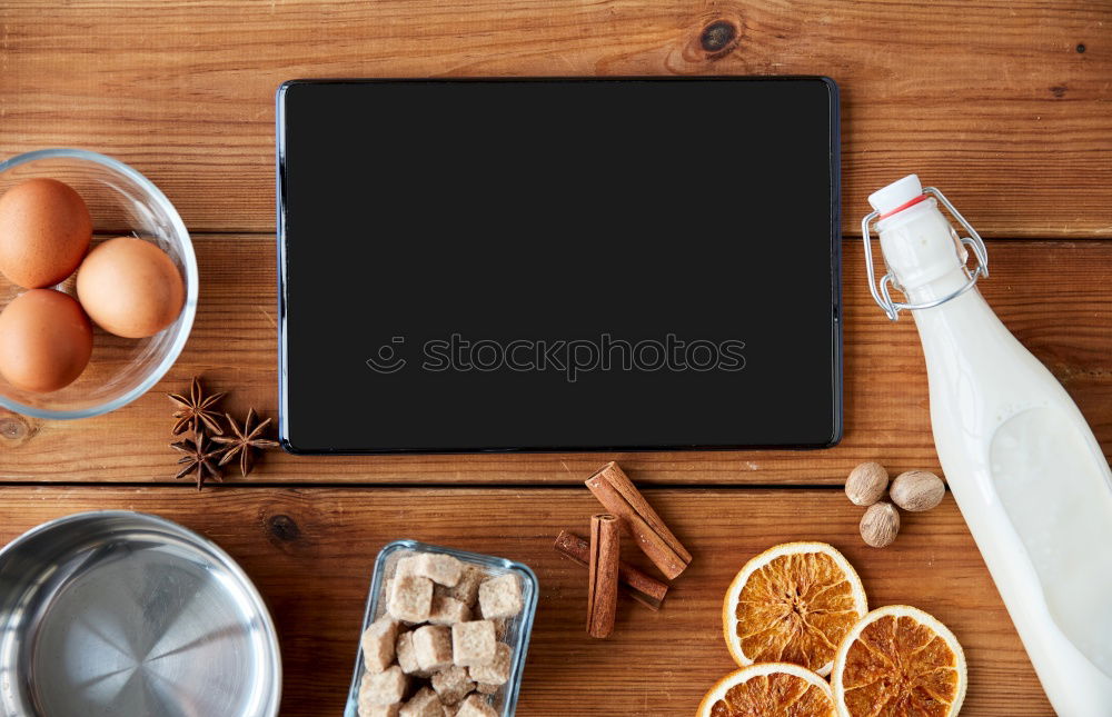 Similar – Image, Stock Photo Hands with tablet PC on kitchen table with pumpkin