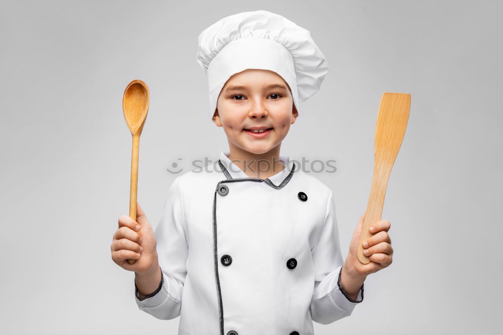 Similar – Grandfather With Grandson with cook hat and mustache on gray background