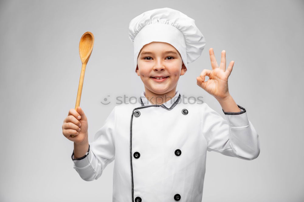 Similar – Grandfather With Grandson with cook hat and mustache on gray background