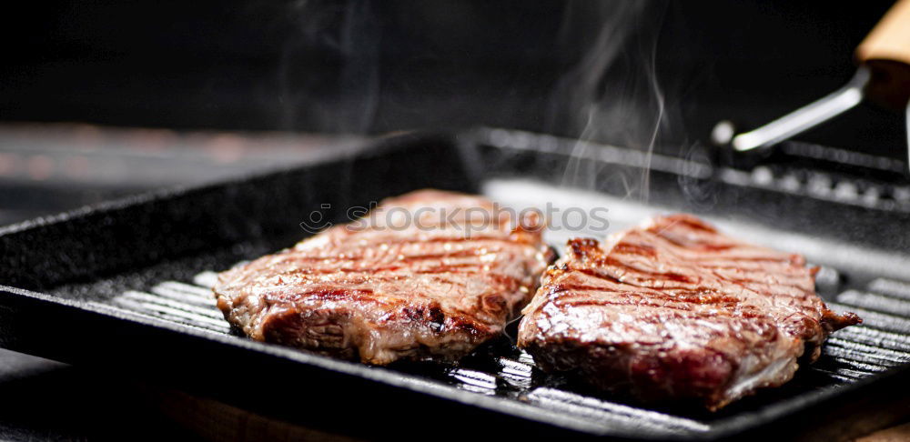 Similar – Image, Stock Photo Steaks in the pan Food