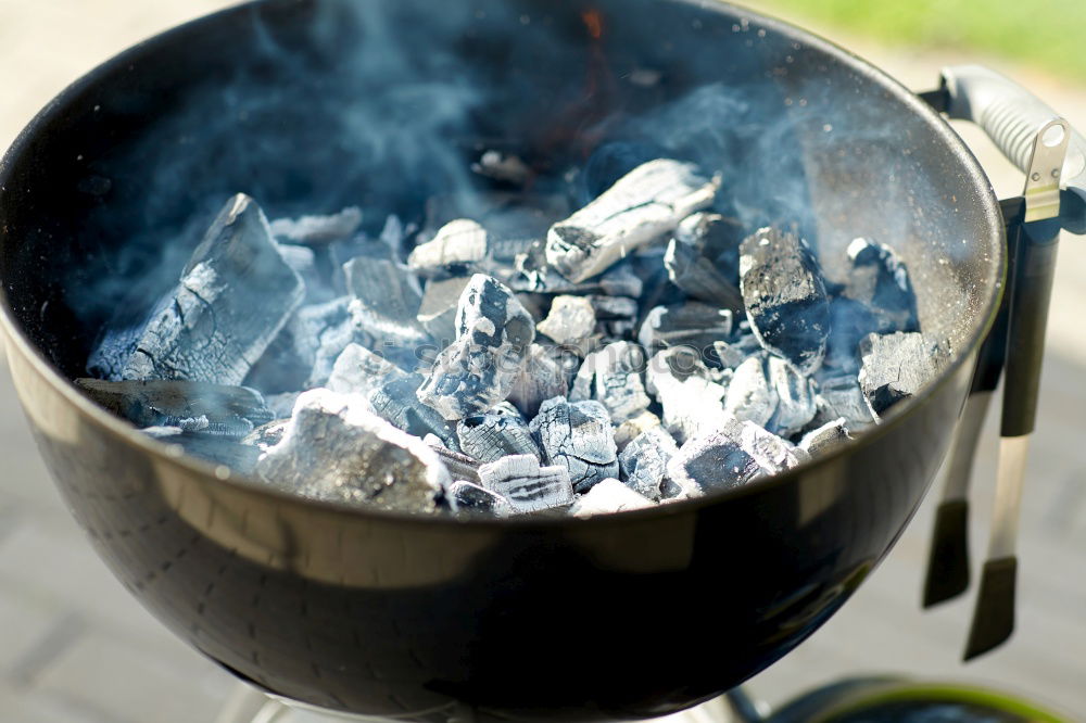 Similar – Hot coals with smoke in grill