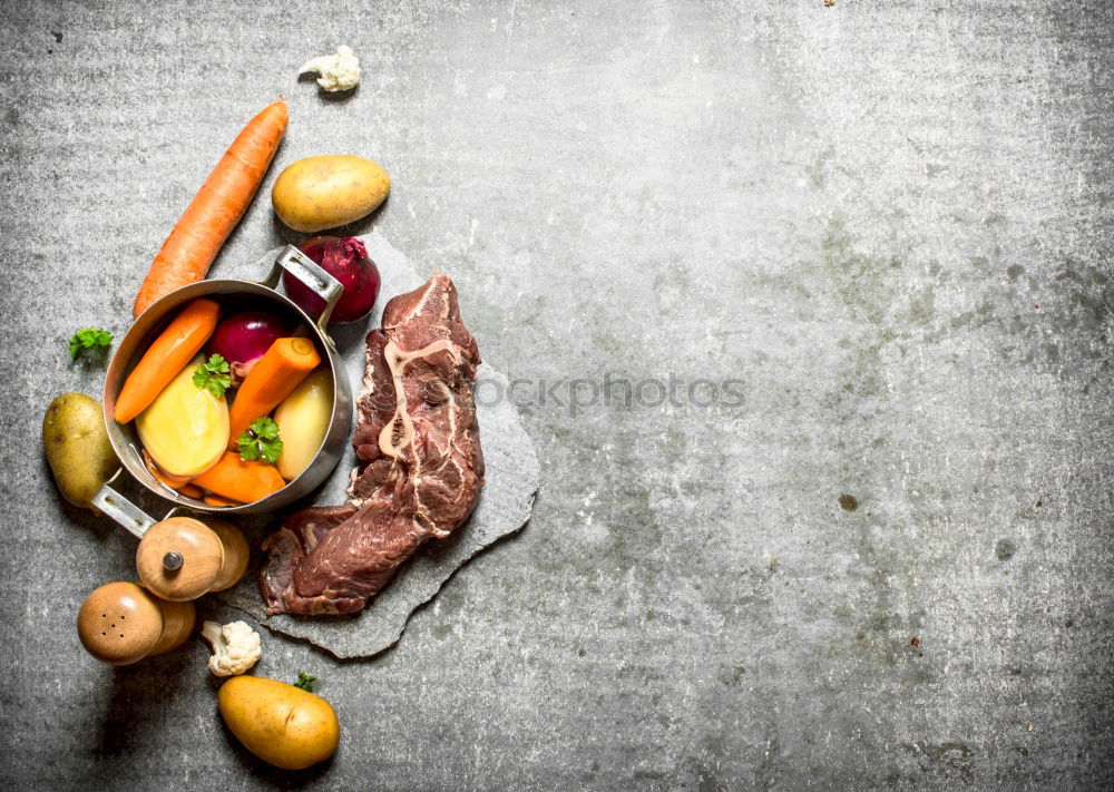 Similar – Grill steak ingredients around empty table.