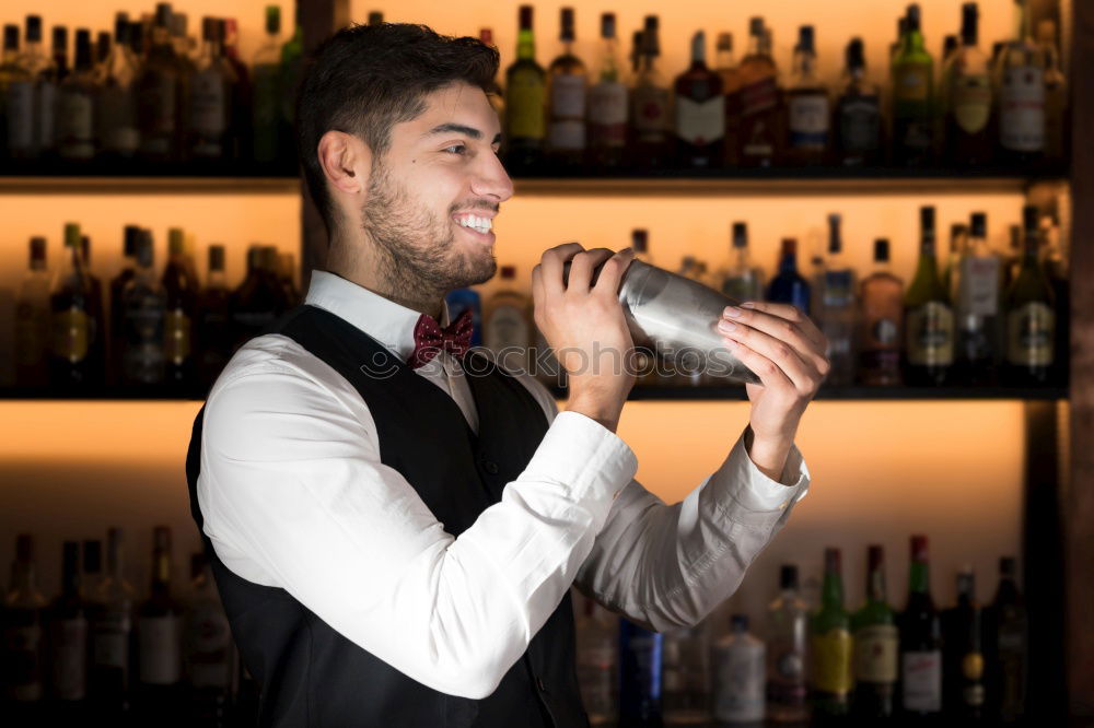 Image, Stock Photo Barman is making cocktail at night club