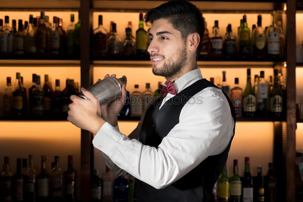 Similar – Barman is making cocktail at night club.