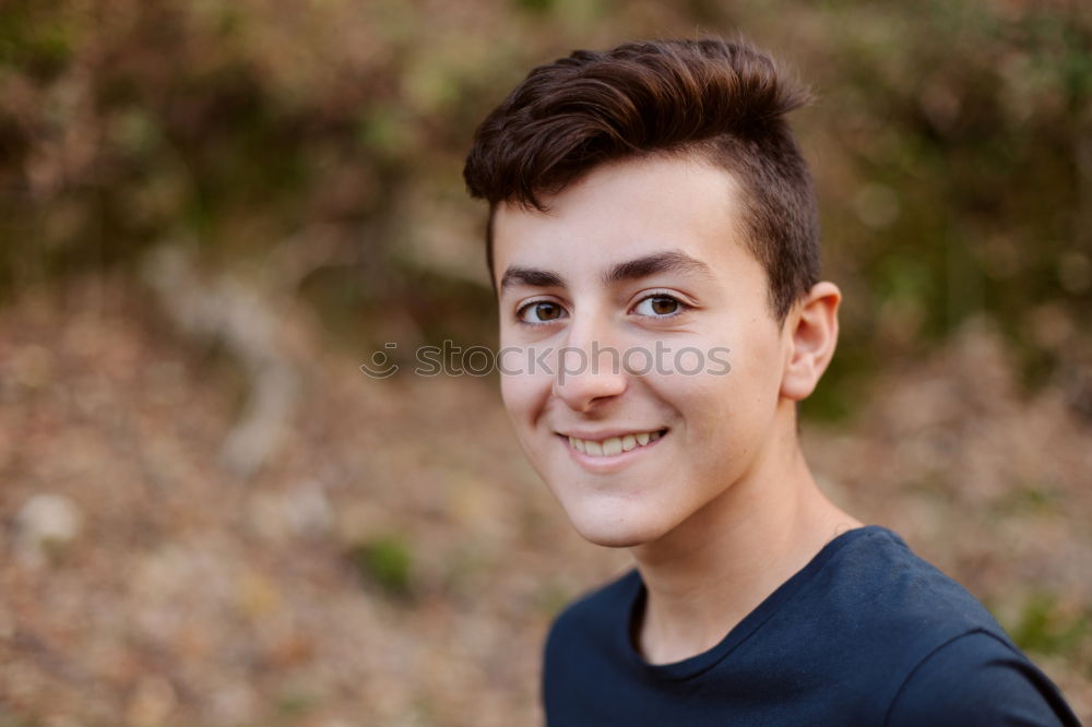 Similar – Attractive teenager guy in a park