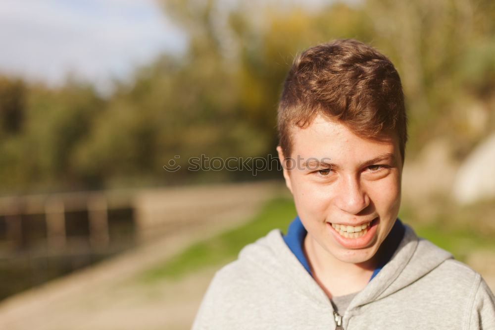 Similar – Attractive teenager guy in a park