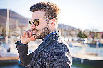 Similar – Image, Stock Photo Handsome caucasian young man in casual clothes in urban environment
