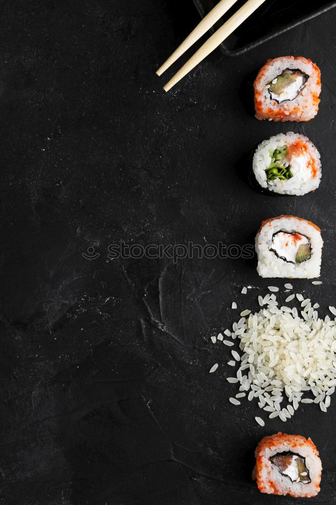 Similar – Chopstick with a sushi on black stone