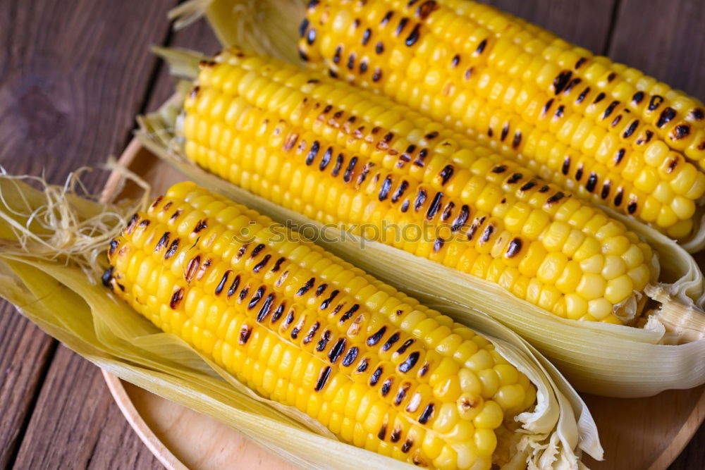 Similar – Roasted corn salted.