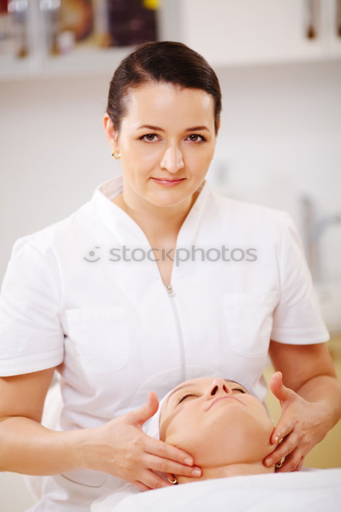 Similar – Professional cosmetician applying a facial mask with cosmetic brush