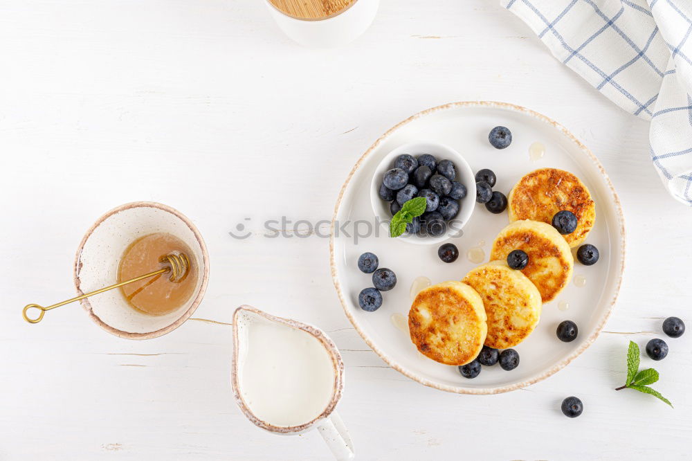 Similar – Pancakes with raspberries and blueberries