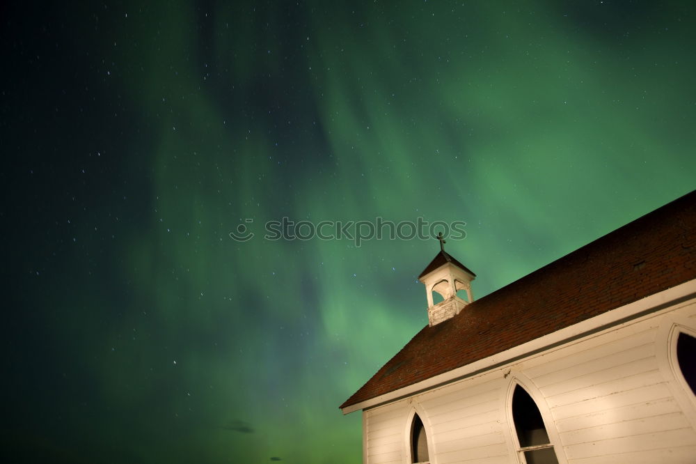 Similar – Church tower with layered clouds