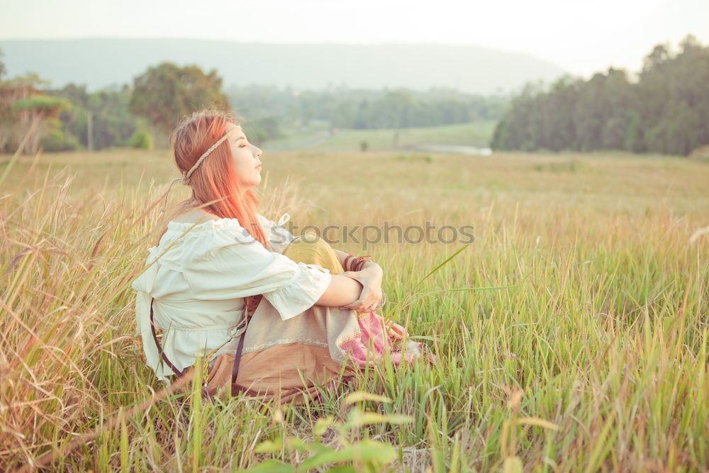 Similar – Image, Stock Photo Young woman is packing her backpack during hiking in summer nature. Concepts of adventure, extreme survival, orienteering. Equipments for hike.