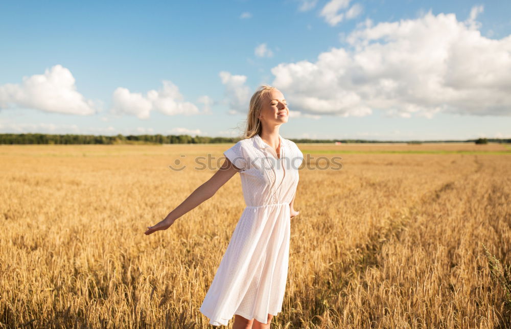 Similar – Image, Stock Photo Young woman walking in a path in the middle of a vineyard