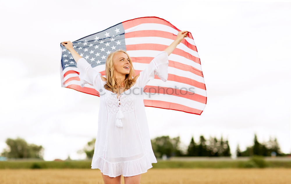 Similar – Teenage girls holding USA flag outdoor