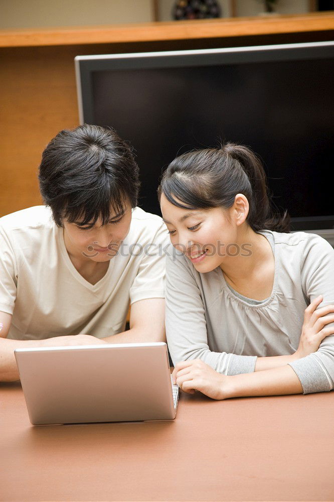 Similar – Image, Stock Photo Two male teenagers browsing the internet in cafe. Entertaining with electronics