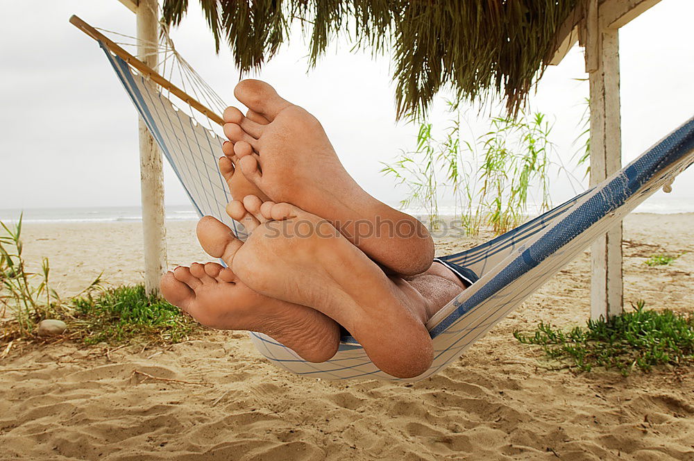 Similar – Image, Stock Photo A young man relaxing on his beach vacation