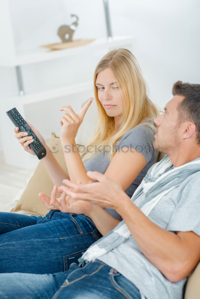 Similar – Image, Stock Photo Couple browsing on online on smartphone at home