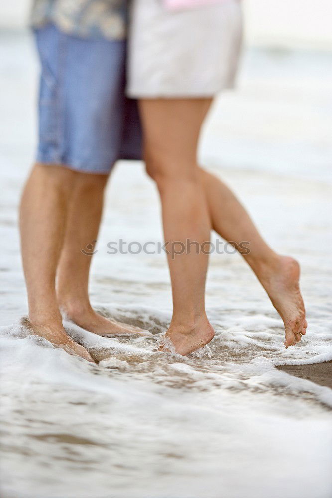 Similar – Image, Stock Photo Crop couple posing on pier