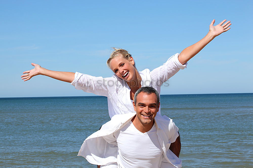 Similar – Image, Stock Photo Father and son playing on the beach at the day time.