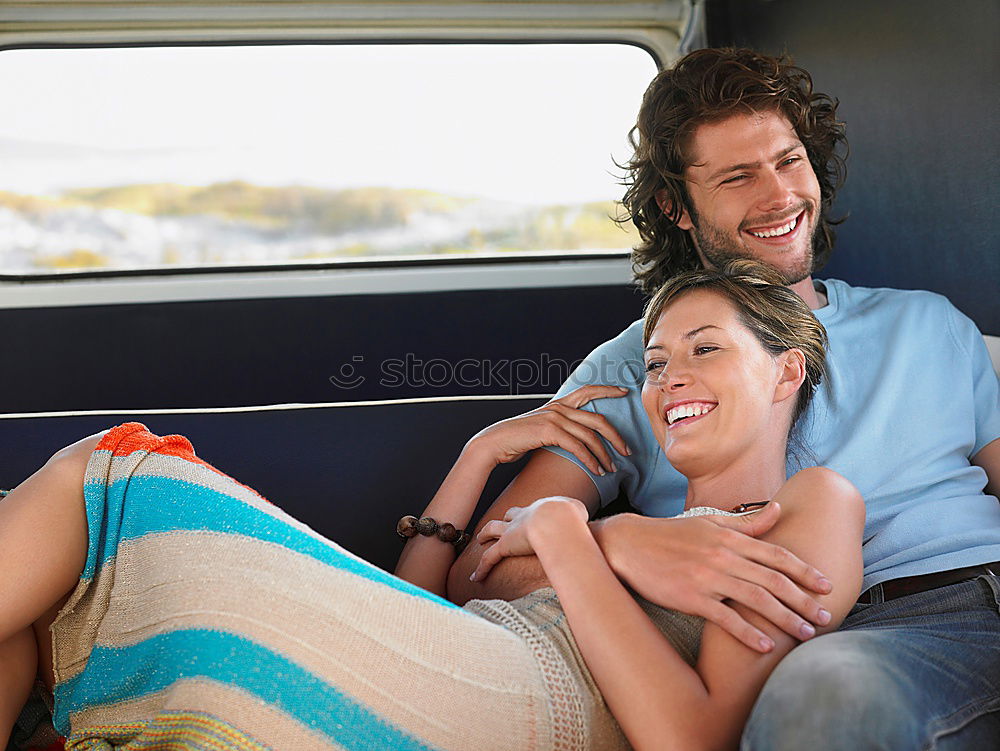 Similar – Image, Stock Photo Couple embracing in car
