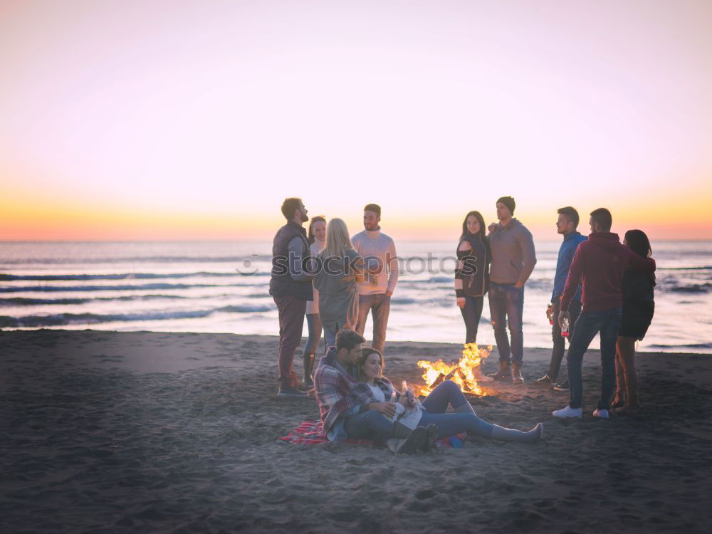 Similar – Image, Stock Photo Hipster friends cheering and dancing at beach party