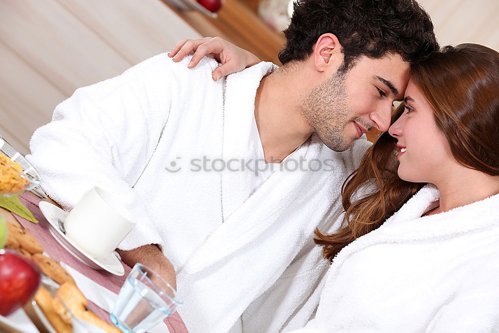 Similar – Happy couple embracing on bed