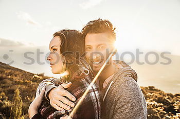 Similar – Image, Stock Photo Young adult adventerous couple hitchhiking together