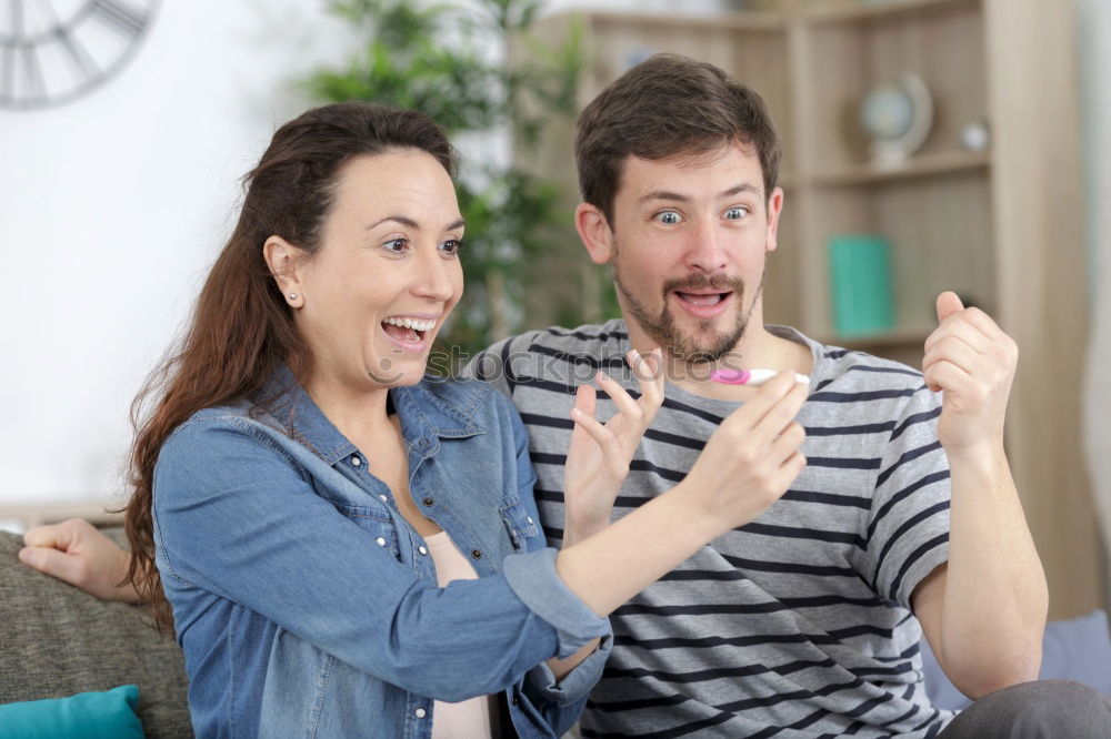 Similar – Image, Stock Photo Happy family in a urban park playing with tablet compute