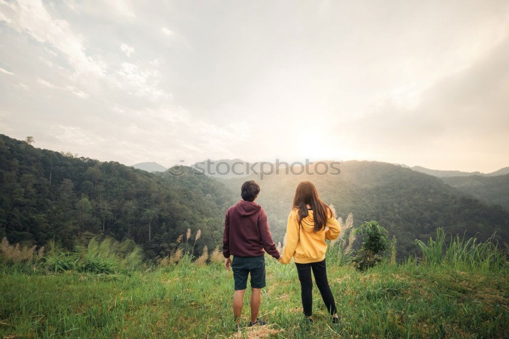 Similar – Women standing at lake