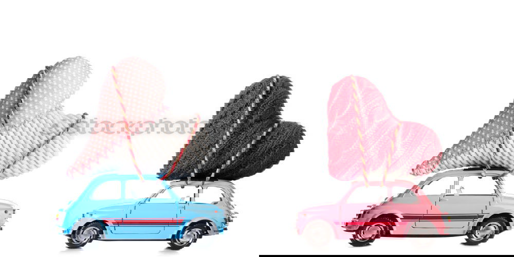 Similar – Image, Stock Photo small wooden children’s car carries a wicker red heart