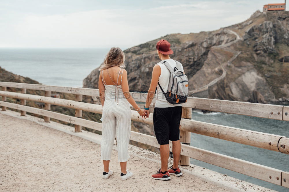 Similar – Image, Stock Photo Coupole holding hands standing on a road