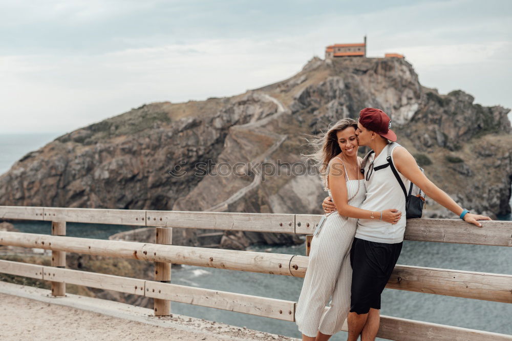 Similar – Women at lake in mountains