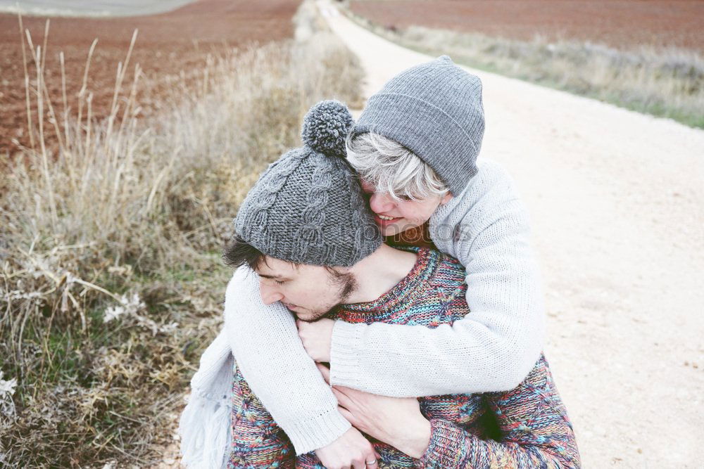 Similar – A couple of happy young people hug each other