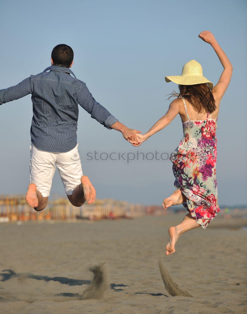 Similar – Father and son playing on the beach at the day time.