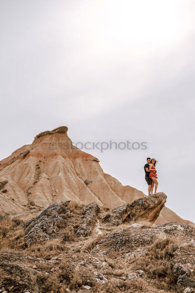 Similar – Image, Stock Photo Women walking on sandy hill